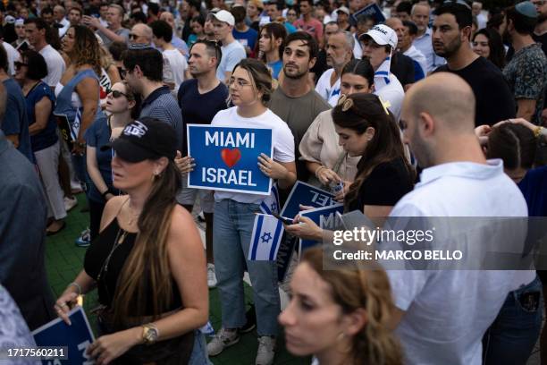 People attend the Israel Solidarity Rally organized by the Greater Miami Jewish Federation at the Holocaust Memorial in Miami Beach, Florida, on...