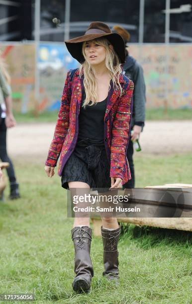 Sienna Miller attends the Glastonbury Festival of Contemporary Performing Arts at Worthy Farm, Pilton on June 28, 2013 in Glastonbury, England.
