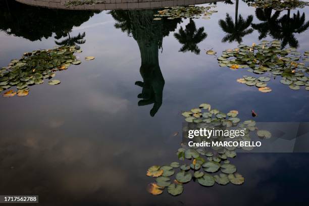 The Holocaust Memorial is seen reflected as people attend the Israel Solidarity Rally organized by the Greater Miami Jewish Federation, in Miami...