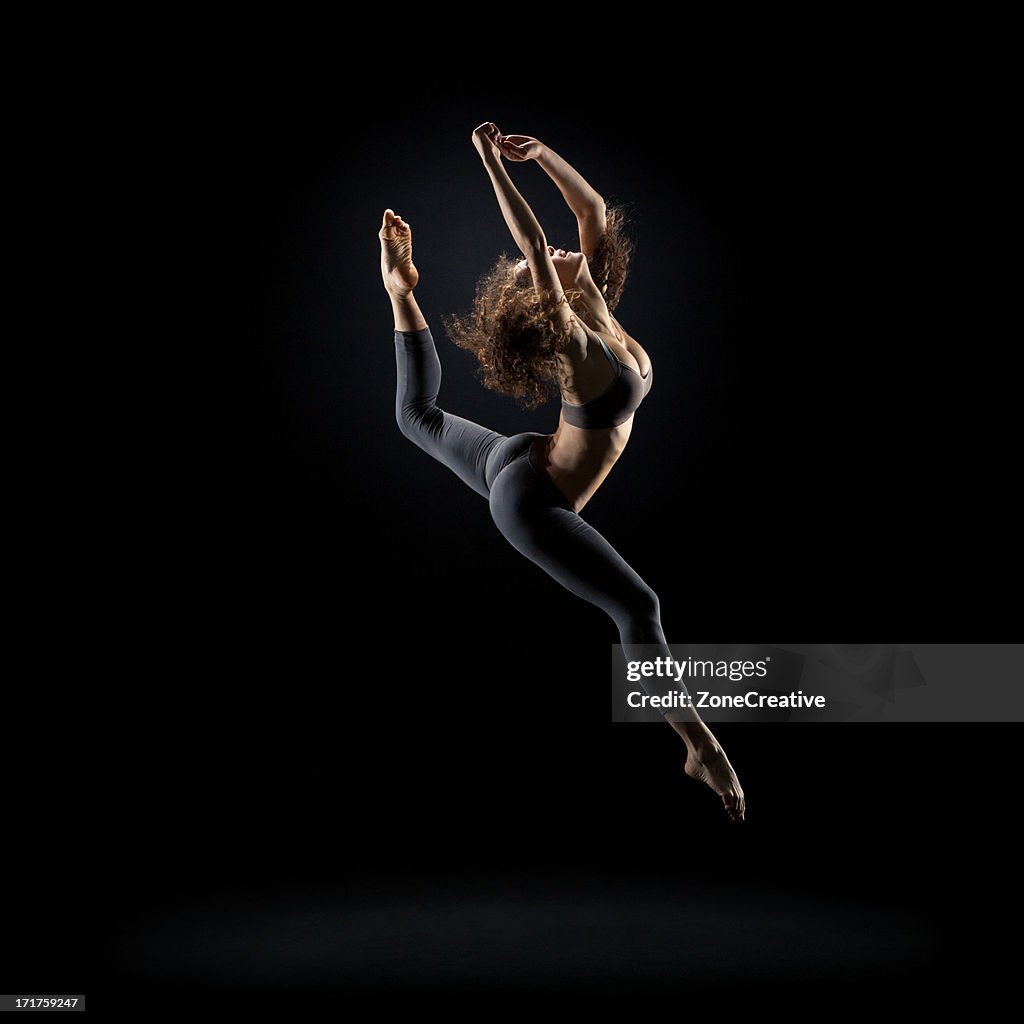 Dancer pose on black background