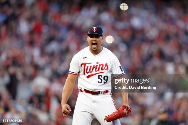 Jhoan Duran of the Minnesota Twins celebrates after defeating the Toronto Blue Jays in Game Two to win the Wild Card Series at Target Field on...