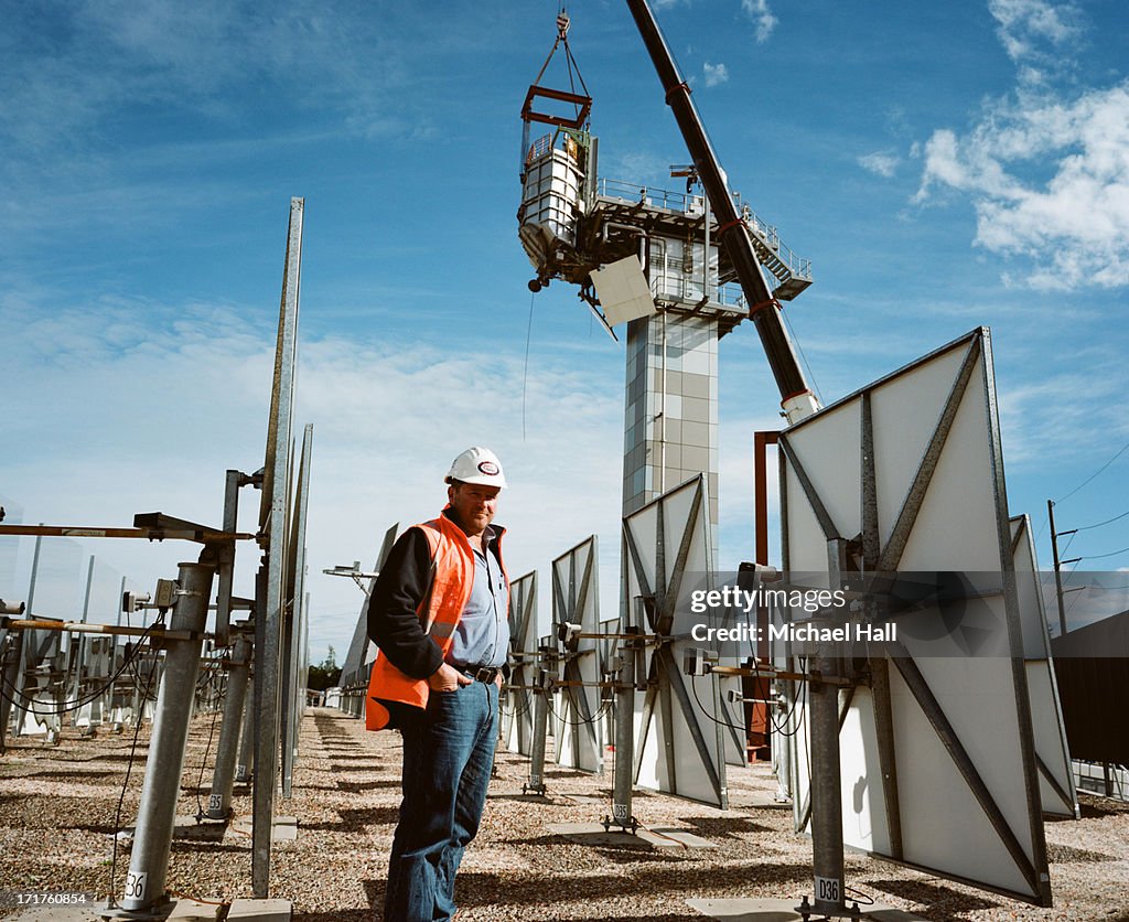 Workman at solar thermal research facility