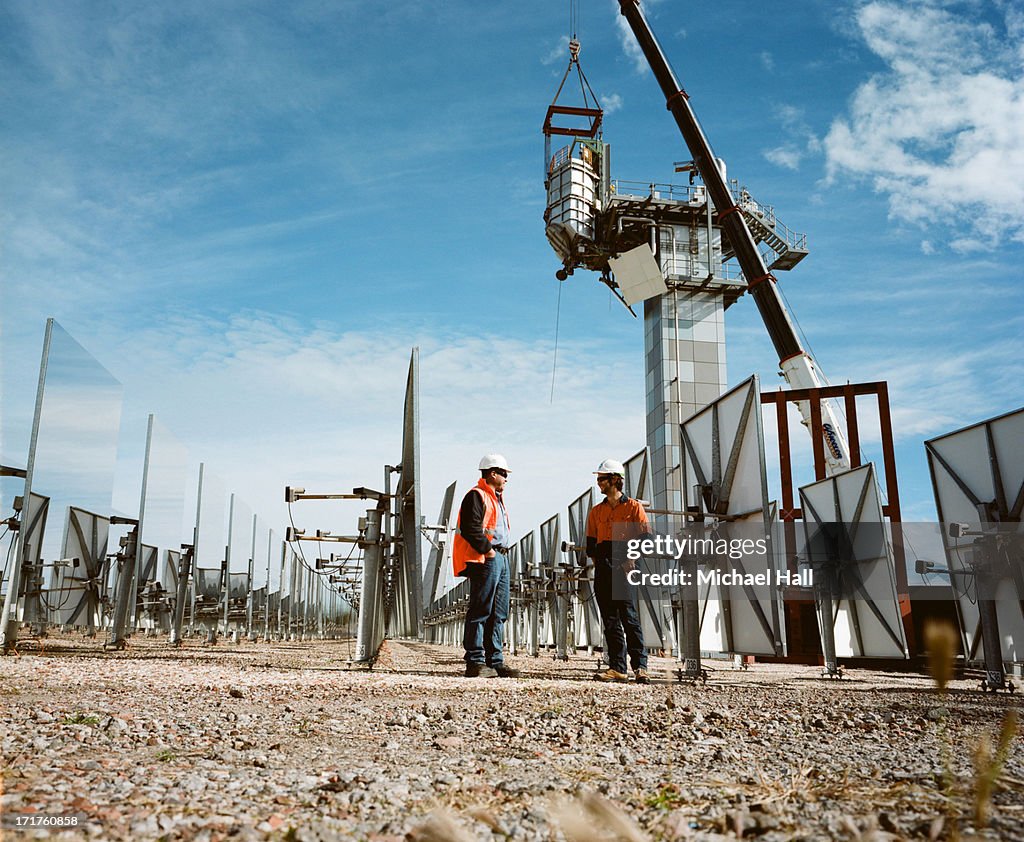 Workmen at solar thermal research facility