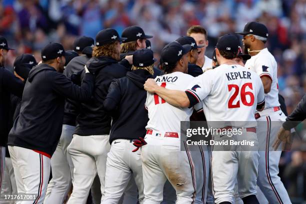 The Minnesota Twins celebrate after defeating the Toronto Blue Jays in Game Two to win the Wild Card Series at Target Field on October 04, 2023 in...