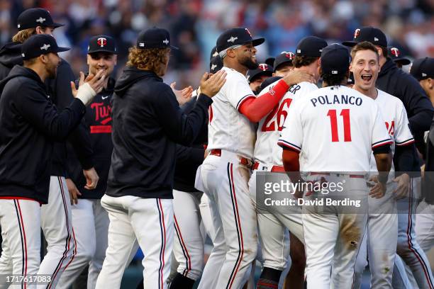 The Minnesota Twins celebrate after defeating the Toronto Blue Jays in Game Two to win the Wild Card Series at Target Field on October 04, 2023 in...