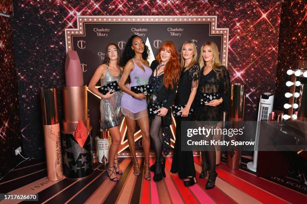 Bella Broekman-Tilbury, Jourdan Dunn, Charlotte Tilbury, Kate Moss and Sofia Schwarzkopf-Tilbury attend the Global unveiling of Charlotte Tilbury's...