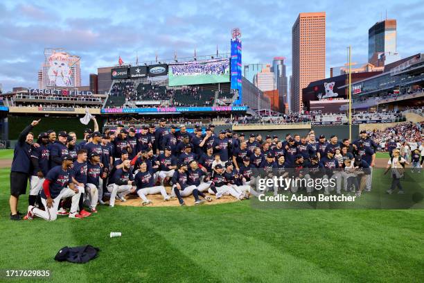 The Minnesota Twins celebrate after defeating the Toronto Blue Jays in Game Two to win the Wild Card Series at Target Field on October 04, 2023 in...