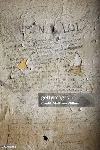 Grafitti on the wall of the holding cell below Courtroom C at the Palace of Justice in Pretoria, South Africa, 16th February 2011. Prisoners were...