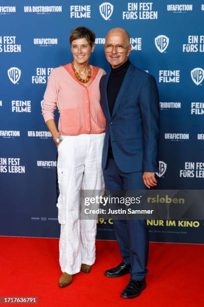 Gisi Herbst and Christoph Maria Herbst attend the premiere of "Ein Fest Fürs Leben" at Cinedom on October 04, 2023 in Cologne, Germany.