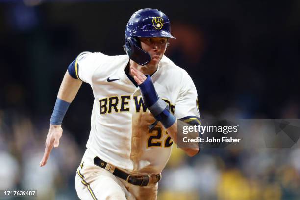 Christian Yelich of the Milwaukee Brewers singles during the first inning against the Arizona Diamondbacks during Game Two of the Wild Card Series at...