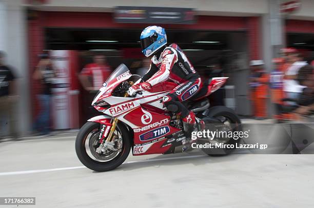 Carlos Checa of Spain and Team Ducati Alstare starts from box during World Superbikes - Practice during the round seven of 2013 Superbike FIM World...