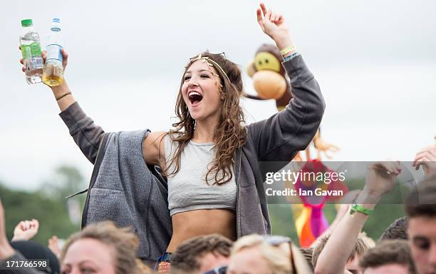 The crowd looks on as 'The Vaccines' perform live on the Pyramid Stage at day 2 of the 2013 Glastonbury Festival at Worthy Farm on June 28, 2013 in...