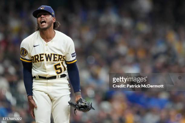 Freddy Peralta of the Milwaukee Brewers reacts to giving up a home ru to Alek Thomas of the Arizona Diamondbacks during the fifth inning of Game Two...