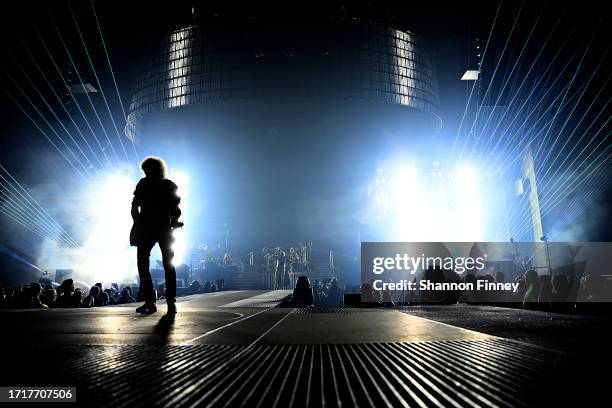 Guitarist Brian May performs onstage as Queen + Adam Lambert kick off the "Rhapsody Tour" at CFG Bank Arena on October 04, 2023 in Baltimore,...