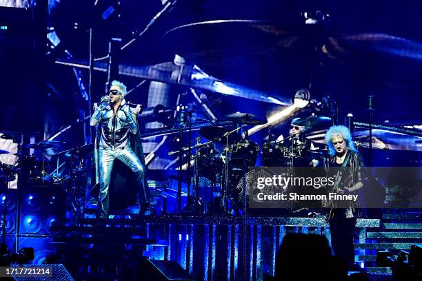 Singer Adam Lambert, drummer Roger Taylor and guitarist Brian May perform onstage as Queen + Adam Lambert kick off the "Rhapsody Tour" at CFG Bank...