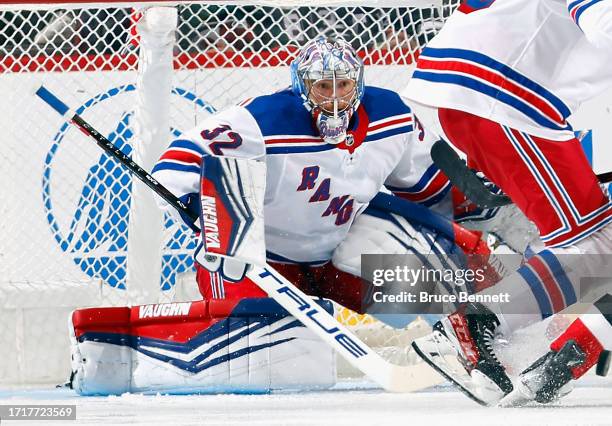 Jonathan Quick of New York Rangers tends net against the New Jersey Devils at Prudential Center on October 04, 2023 in Newark, New Jersey.