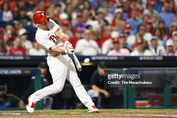 Realmuto of the Philadelphia Phillies hits a solo home run during the fourth inning against the Miami Marlins in Game Two of the Wild Card Series at...