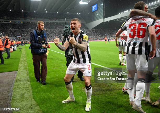 Newcastle player Kieran Trippier celebrates the third Newcastle goal scored by Sean Longstaff during the UEFA Champions League match between...