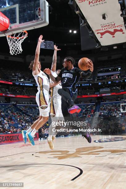 Chuma Okeke of the Orlando Magic looks to pass the ball during the game against the New Orleans Pelicans on October 10, 2023 at the Smoothie King...