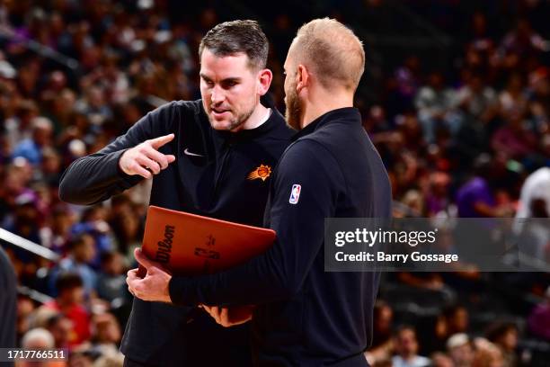 Assistant Coach Greg St. Jean of the Phoenix Suns looks on during the game against the Denver Nuggets on October 10, 2023 at Footprint Center in...