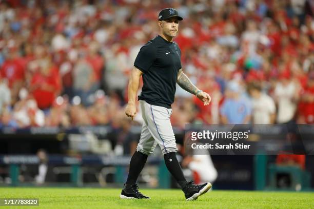 Miami Marlins manager Skip Schumaker makes a pitching change during the sixth inning against the Philadelphia Phillies in Game Two of the Wild Card...