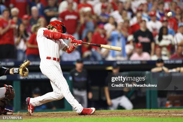 Bryson Stott of the Philadelphia Phillies hits a grand slam during the sixth inning against the Miami Marlins in Game Two of the Wild Card Series at...