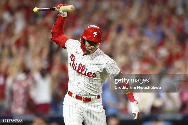 Bryson Stott of the Philadelphia Phillies celebrates after hitting a grand slam during the sixth inning against the Miami Marlins in Game Two of the...