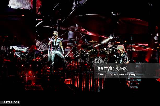 Singer Adam Lambert, drummer Roger Taylor, and guitarist Brian May perform onstage as Queen + Adam Lambert kick off the "Rhapsody Tour" at CFG Bank...