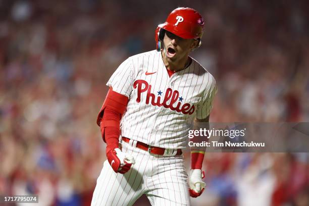 Bryson Stott of the Philadelphia Phillies celebrates after hitting a grand slam during the sixth inning against the Miami Marlins in Game Two of the...