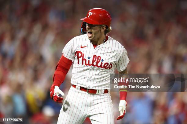 Bryson Stott of the Philadelphia Phillies celebrates after hitting a grand slam during the sixth inning against the Miami Marlins in Game Two of the...