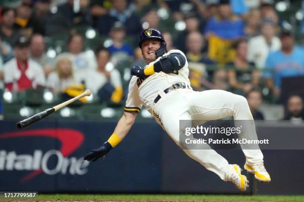 Josh Donaldson of the Milwaukee Brewers is hit by a pitch during the ninth inning against the Arizona Diamondbacks in Game Two of the Wild Card...