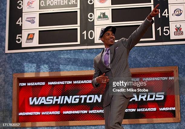 Otto Porter of Georgetown reacts as he walks off stage after he was drafted overall in the first round by the Washington Wizards during the 2013 NBA...