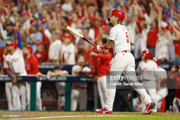 Bryson Stott of the Philadelphia Phillies reacts after hitting a grand slam during the sixth inning against the Miami Marlins in Game Two of the Wild...