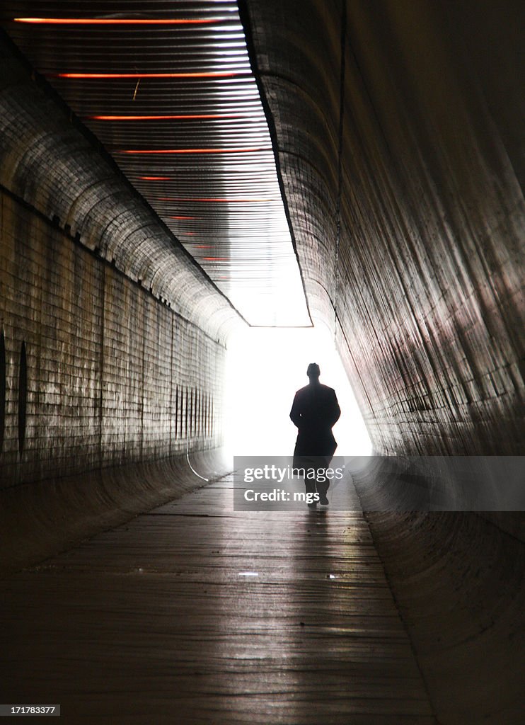 Man in tunnel