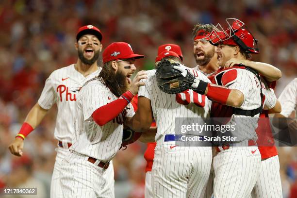 The Philadelphia Phillies celebrate defeating the Miami Marlins 7-1 in Game Two of the Wild Card Series at Citizens Bank Park on October 04, 2023 in...