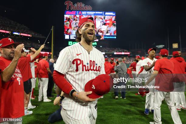 Bryce Harper of the Philadelphia Phillies celebrates after defeating the Miami Marlins 7-1 in Game Two of the Wild Card Series at Citizens Bank Park...