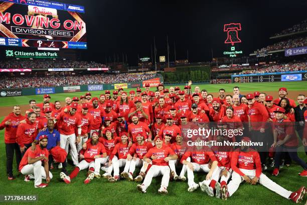 The Philadelphia Phillies pose after defeating the Miami Marlins 7-1 in Game Two of the Wild Card Series at Citizens Bank Park on October 04, 2023 in...