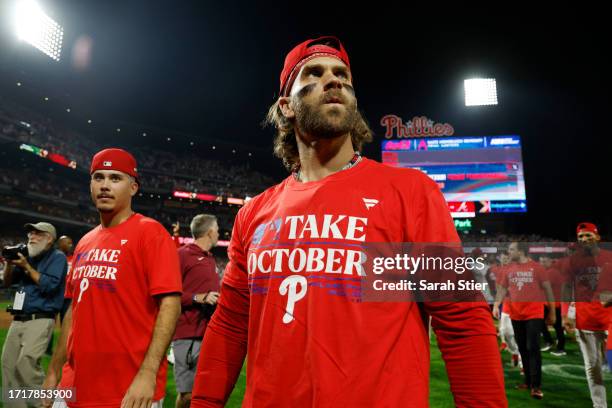 Bryce Harper of the Philadelphia Phillies reacts after defeating the Miami Marlins 7-1 in Game Two of the Wild Card Series at Citizens Bank Park on...