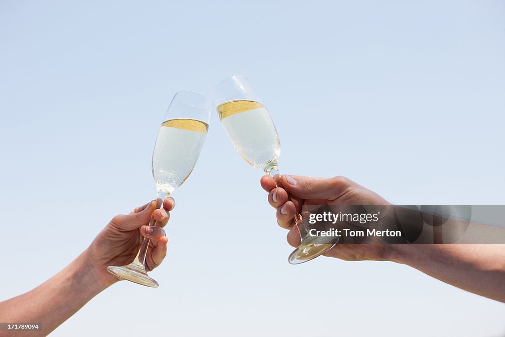 Couple drinking Champagne and toasting