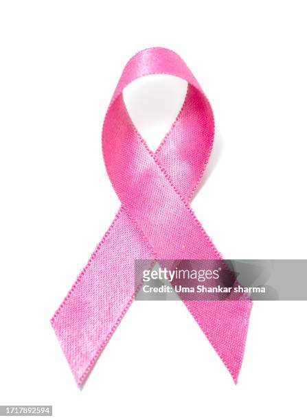 pink breast cancer awareness ribbon - krebsschleife stock-fotos und bilder
