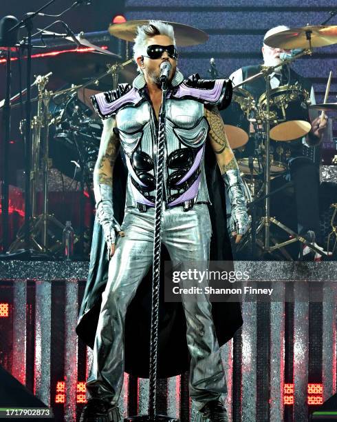 Singer Adam Lambert and drummer Roger Taylor perform onstage as Queen + Adam Lambert kick off the "Rhapsody Tour" at CFG Bank Arena on October 04,...