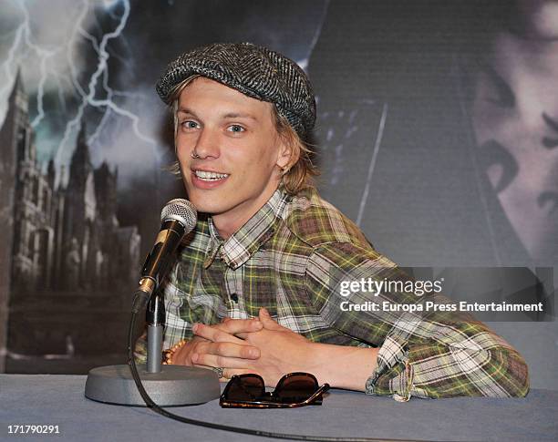 Jamie Campbell Bower signs autographs to fans of 'Shadow Hunters' on June 27, 2013 in Barcelona, Spain.