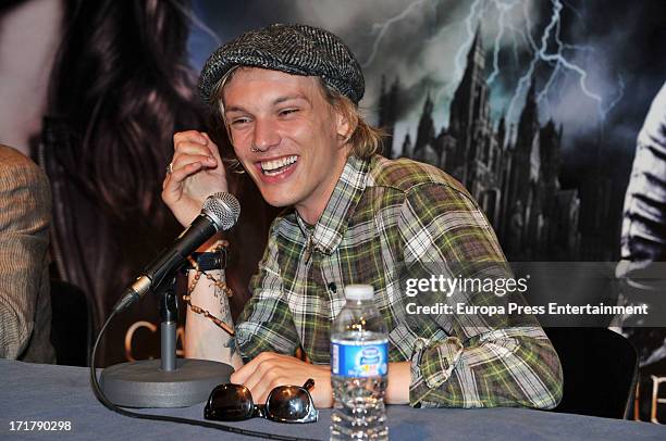 Jamie Campbell Bower signs autographs to fans of 'Shadow Hunters' on June 27, 2013 in Barcelona, Spain.