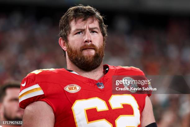 Joe Thuney of the Kansas City Chiefs stands on the sidelines during the national anthem prior to an NFL football game against the New York Jets at...