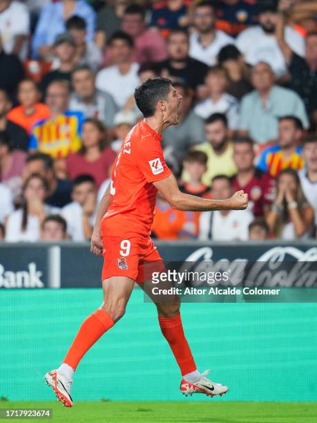 Carlos Fernandez of Real Sociedad celebrates after scoring the team's first goal during the LaLiga EA Sports match between Valencia CF and Real...