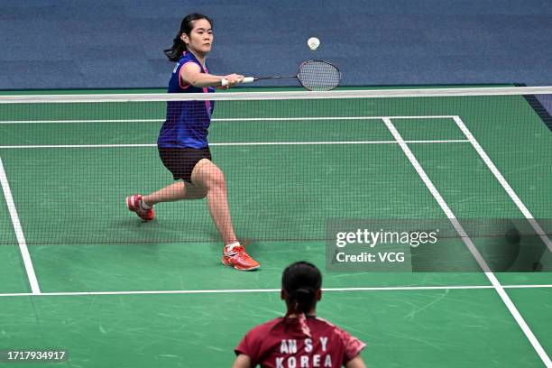 Busanan Ongbamrungphan of Team Thailand competes in the Badminton - Women's Singles Quarterfinal match against An Seyoung of Team South Korea on day...