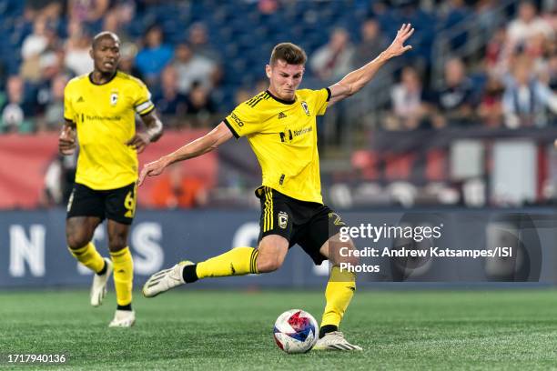 Sean Zawadzki of Columbus Crew takes a shot during a game between Columbus Crew and New England Revolution at Gillette Stadium on October 4, 2023 in...