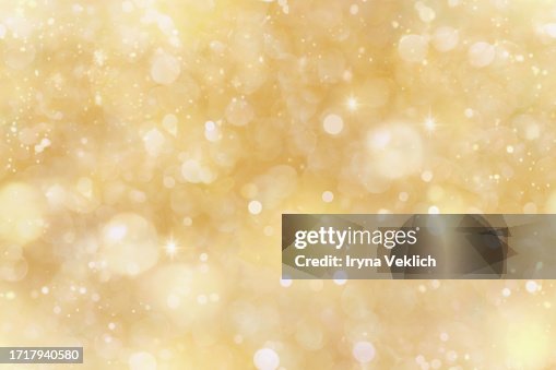 Sparkling Background with Yellow Beige Bokeh made of Elegant Gold Christmas Lights. Sparkling Background with Yellow Beige Bokeh made of Elegant Gold Christmas Lights.