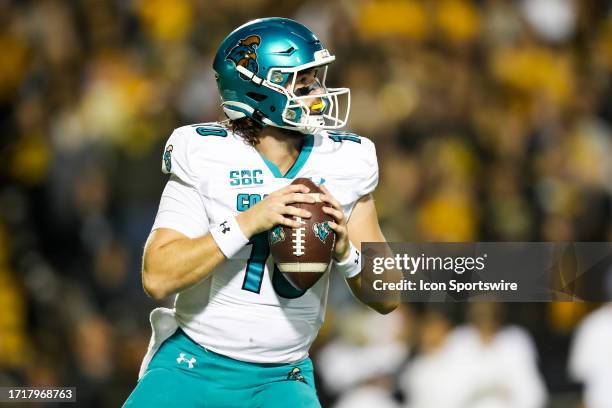 Grayson McCall of the Coastal Carolina Chanticleers looks to pass the ball during a football game against the Appalachian State Mountaineers at Kidd...