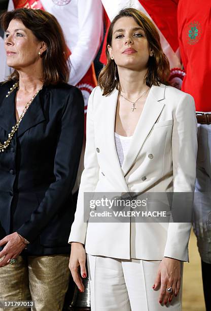 Charlotte Casiraghi and her mother Princess Caroline of Hanover stand during the podium ceremony at the 2013 Monaco International Jumping as part of...